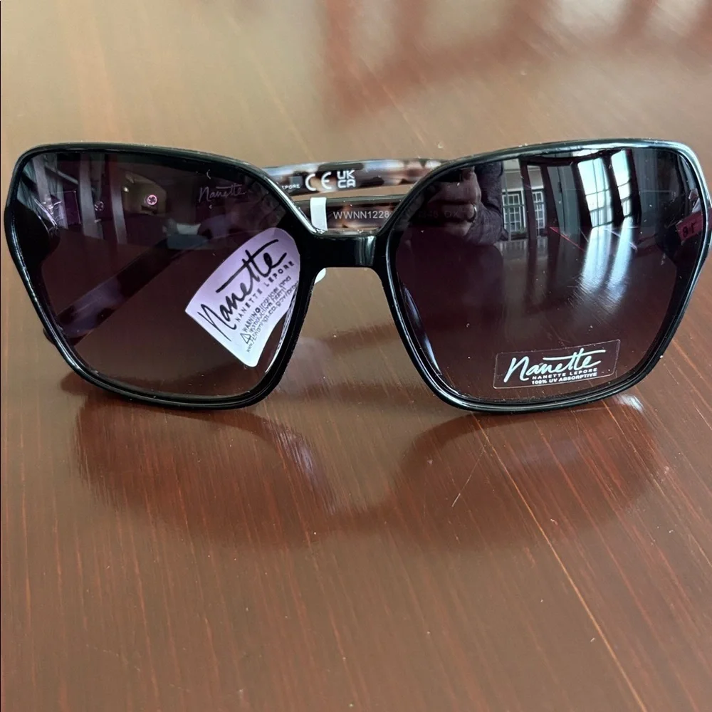 Nanette Lepore 100% UV protect,black frame,tortoise arms,black lens sunglasses